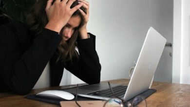 Frustrated staring at laptop