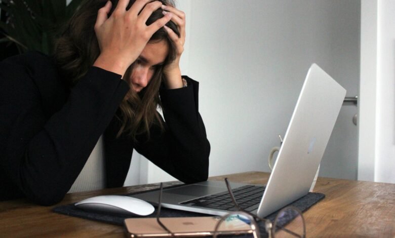 Frustrated staring at laptop