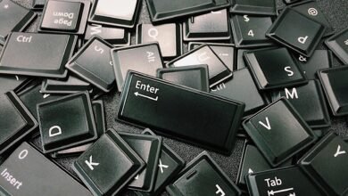 A pile of computer keyboard keys jumbled together