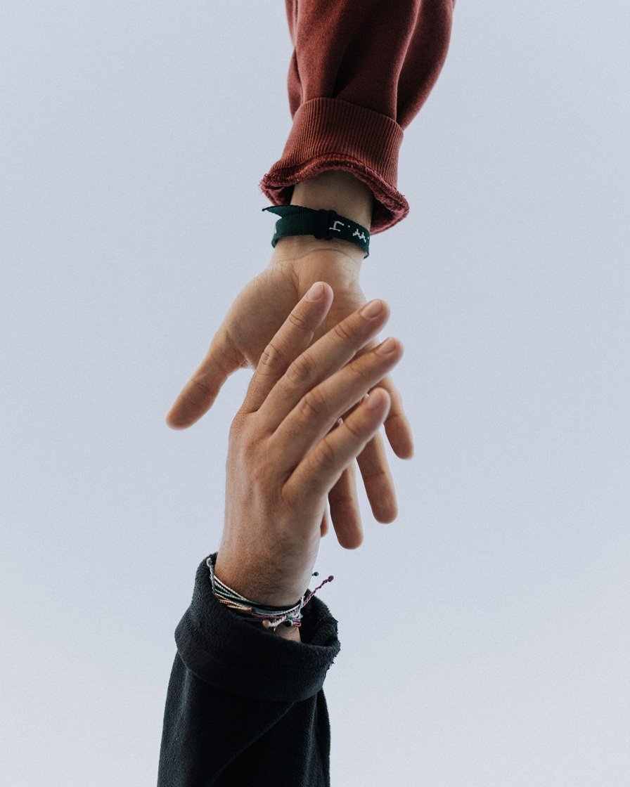 image of two human hands about to touch